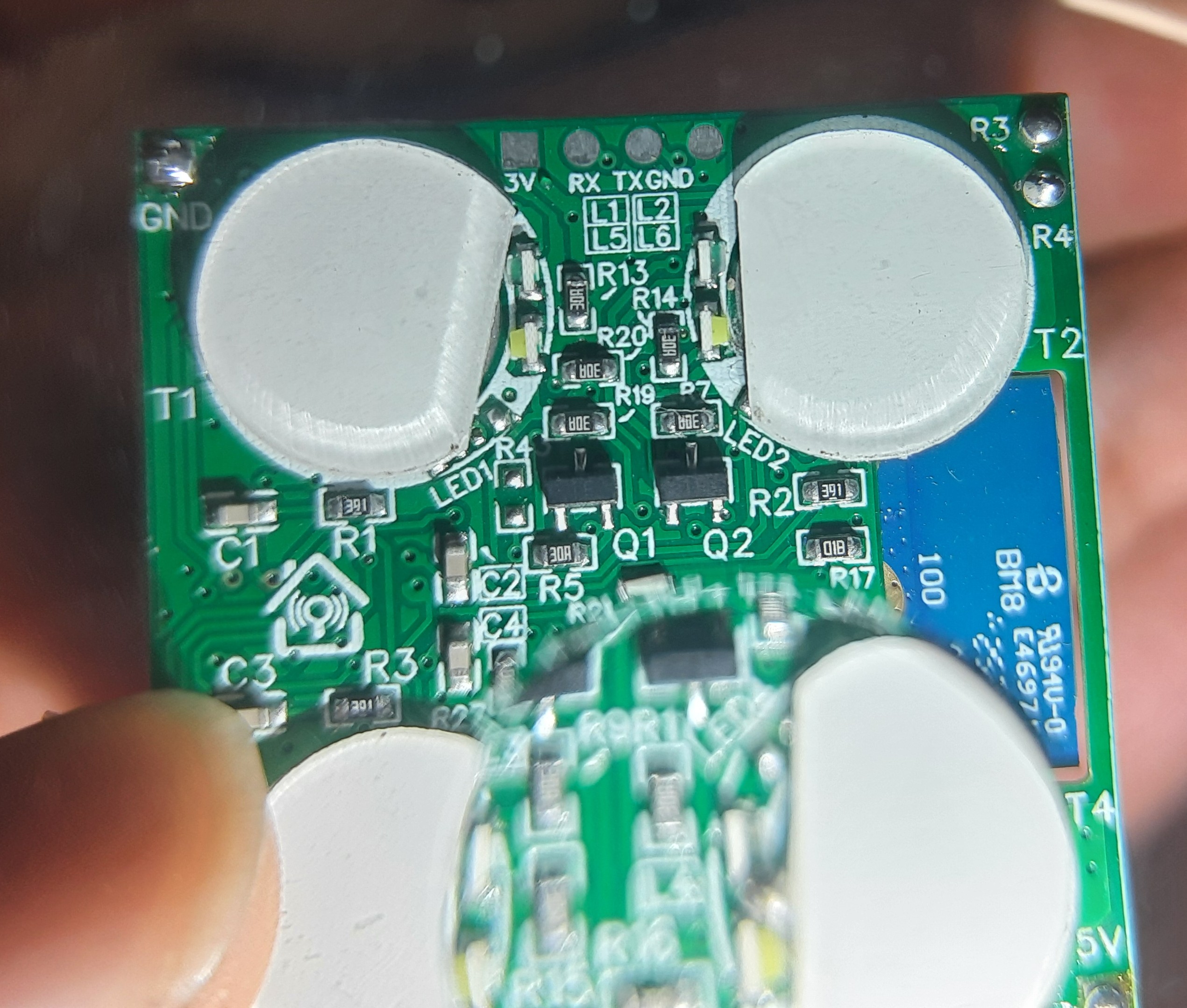 PCB Closeup and Visible Serial Pads closeup of pcb